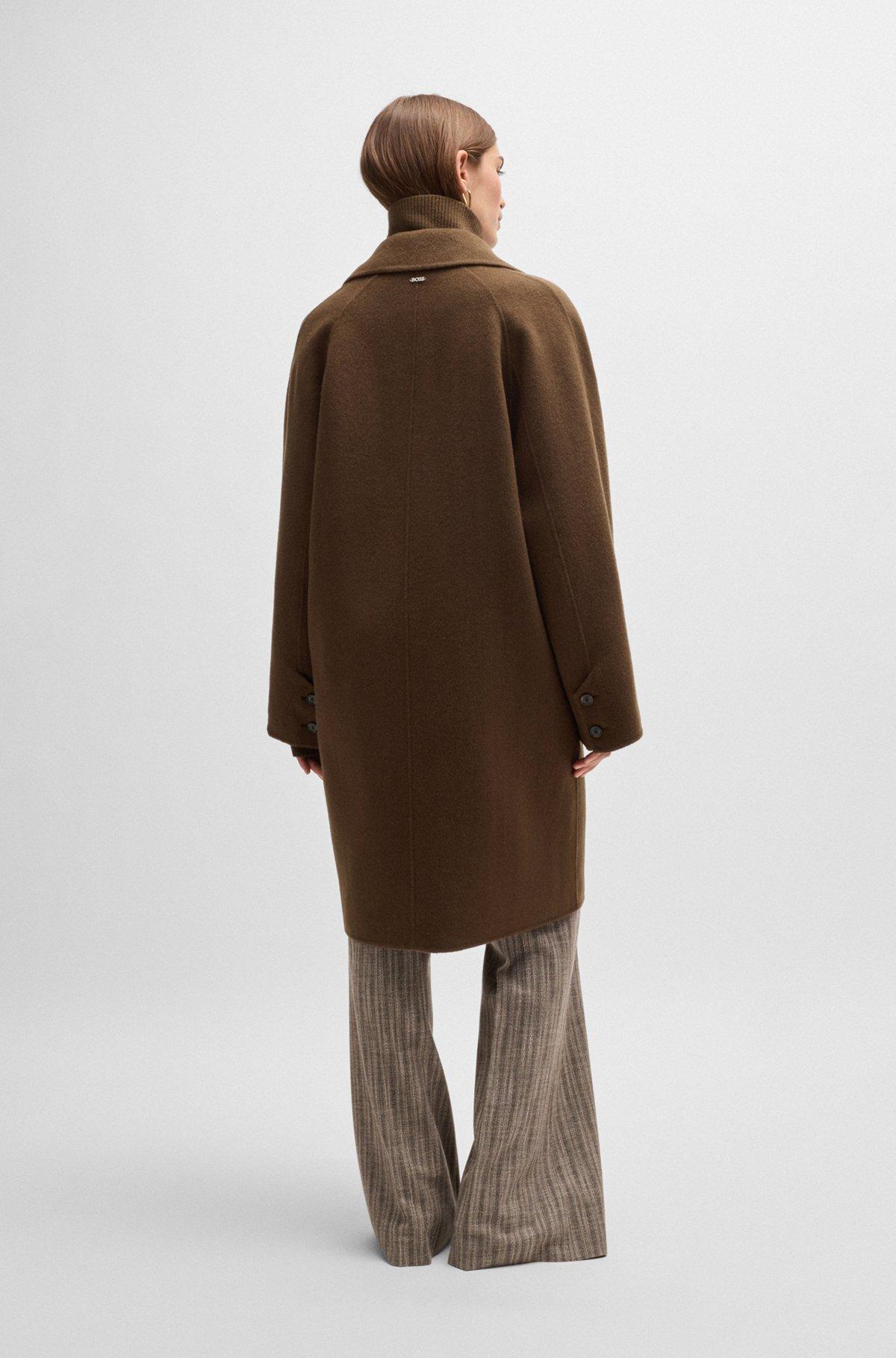 Wool coat with buttoned cuffs and signature accents Product Image