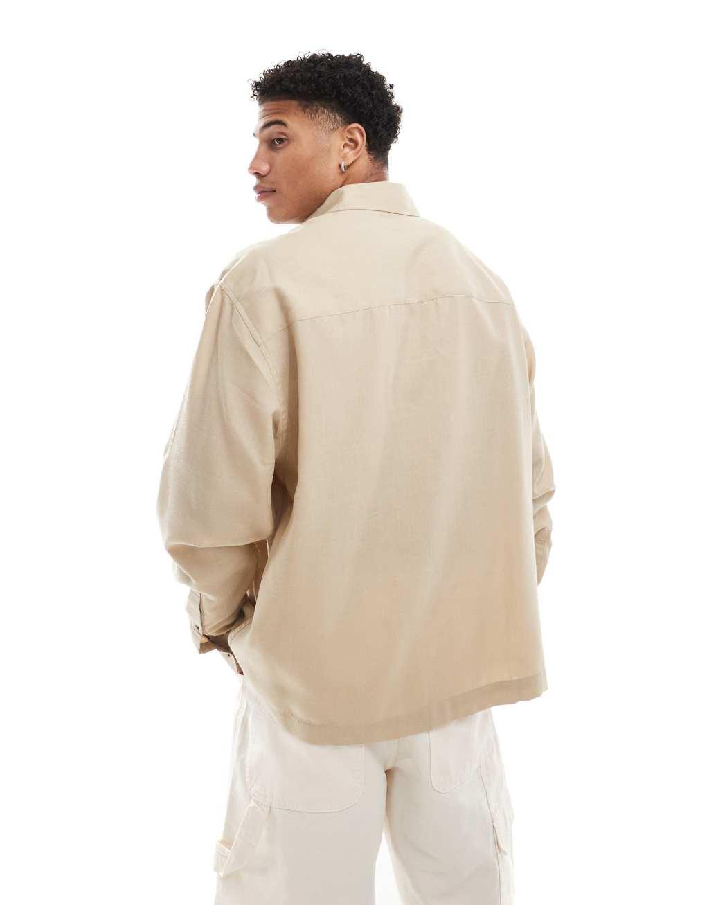 ASOS DESIGN oversized square collar shirt with cargo pockets in beige Product Image