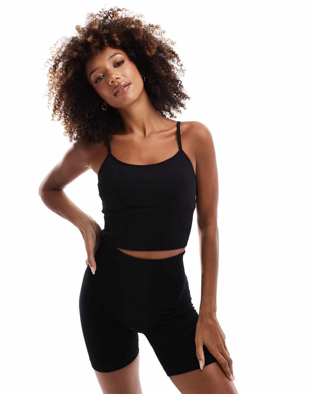 ASOS 4505 Icon seamless ribbed yoga tank top with shelf bra in black Product Image