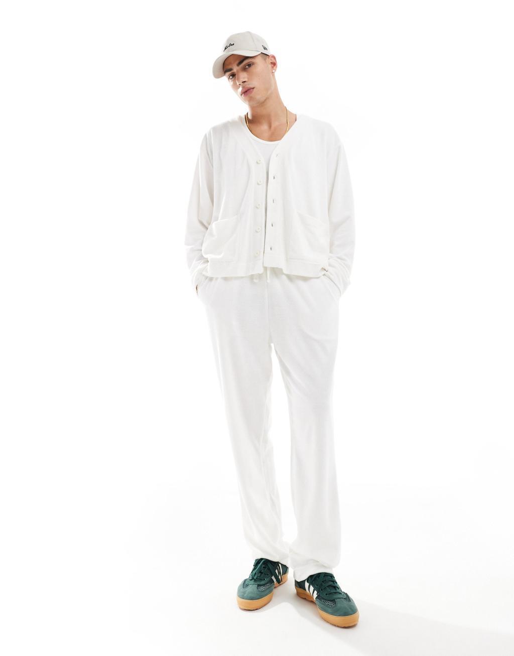 ASOS DESIGN straight leg sweatpants in texture in off white Product Image