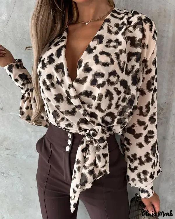 Olivia Mark – Leopard Print Lantern Sleeve Tied Wrap Top Product Image