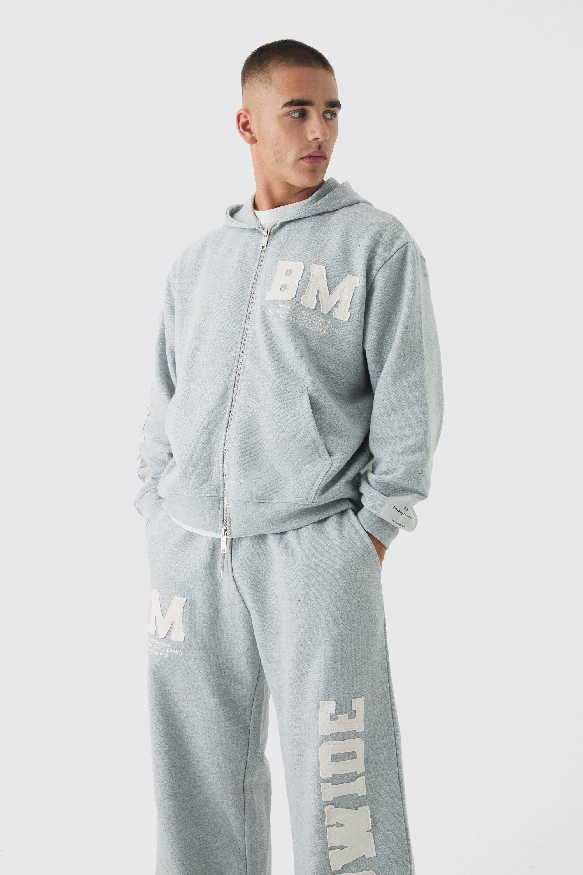 Oversized Boxy Worldwide Raw Edge Applique Zip Through Tracksuit | boohooMAN USA Product Image