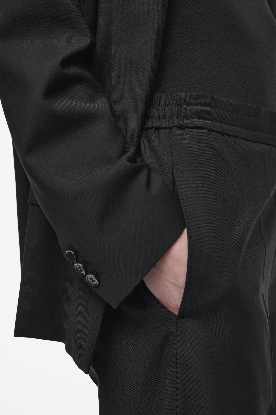 STRAIGHT-LEG ELASTICATED WOOL PANTS Product Image