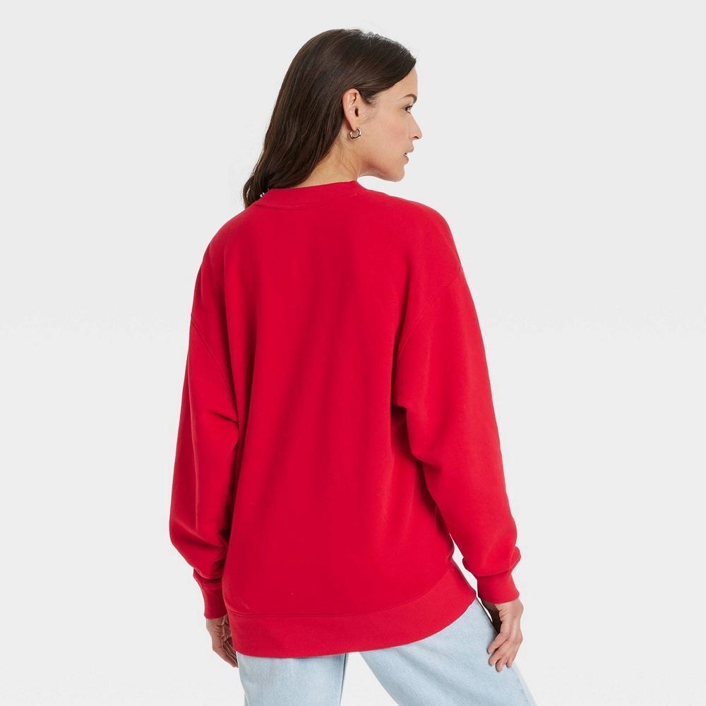 Women's Leisure Studio Oversized Pullover Sweatshirt - Universal Thread™ Red XS Product Image