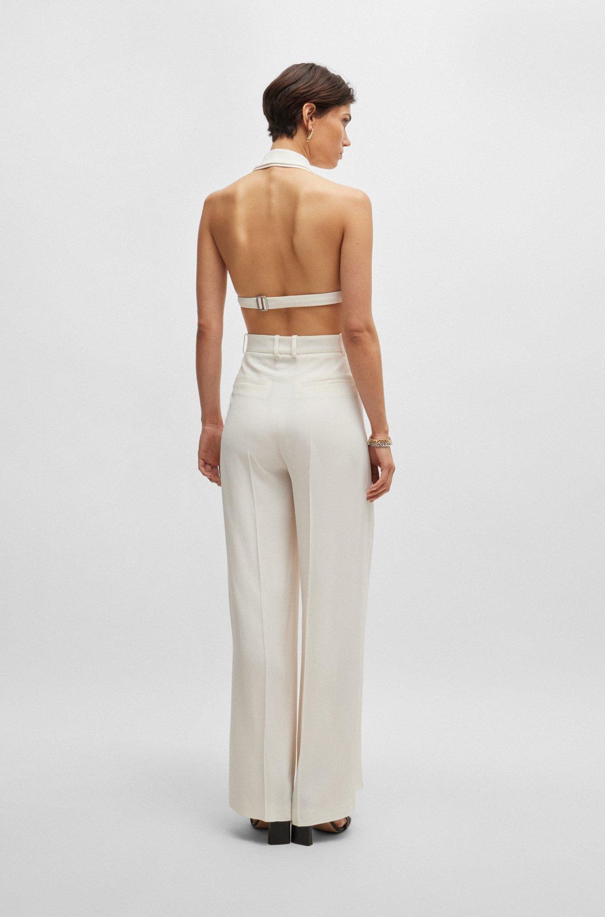 Halterneck jumpsuit with peak lapels Product Image