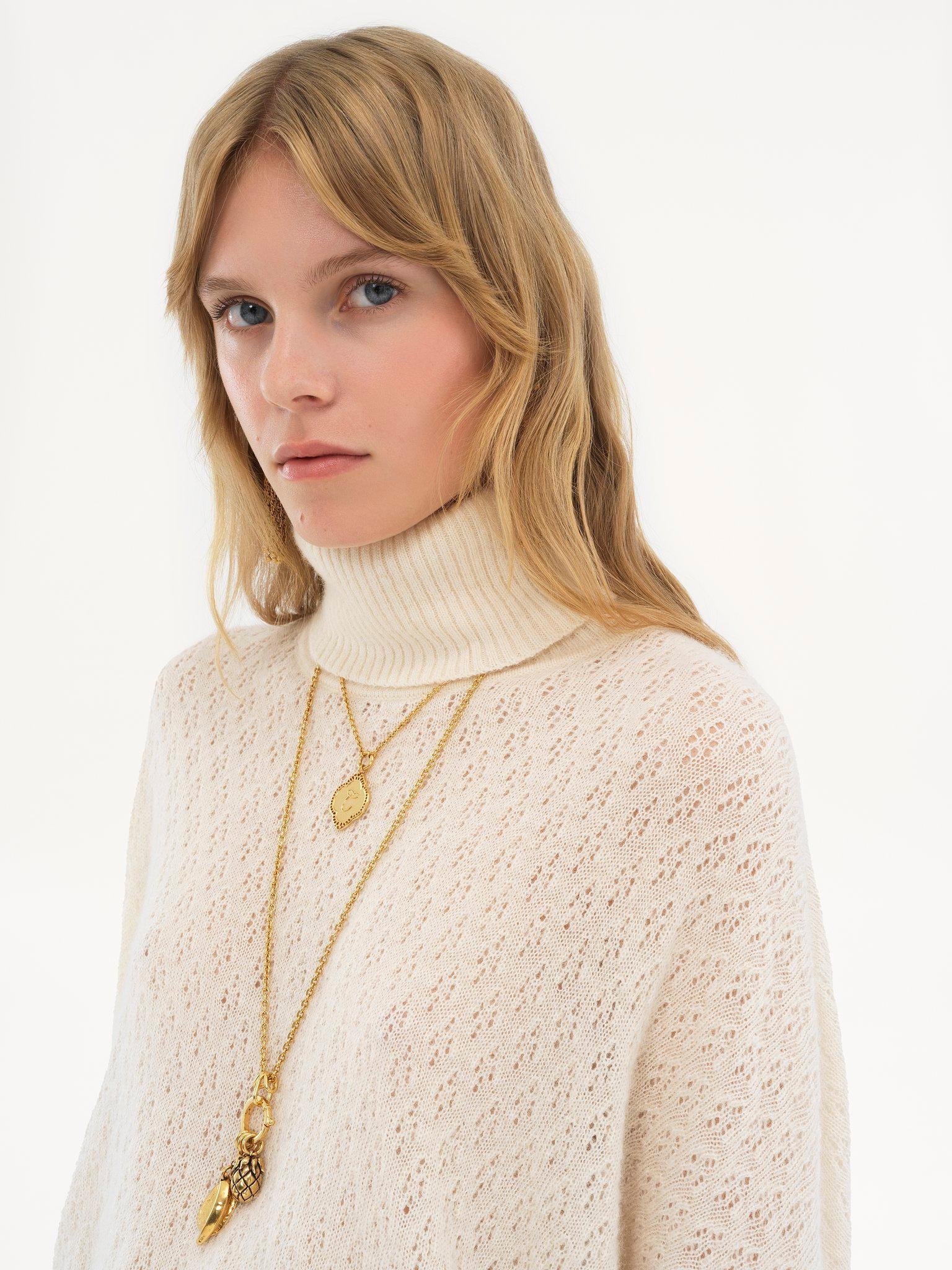 Generous turtleneck sweater in pointelle knit Product Image