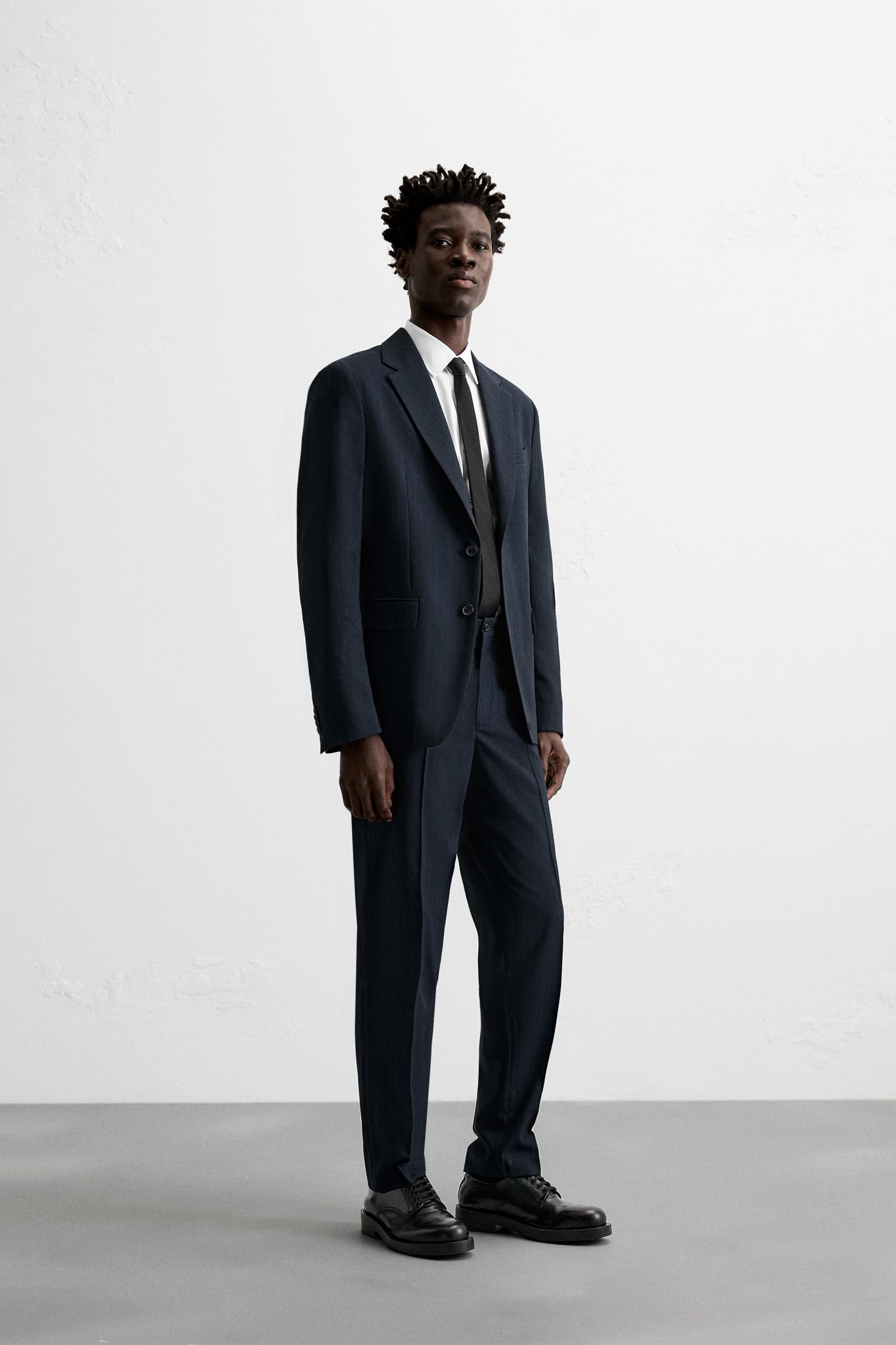 PINSTRIPE SUIT Product Image