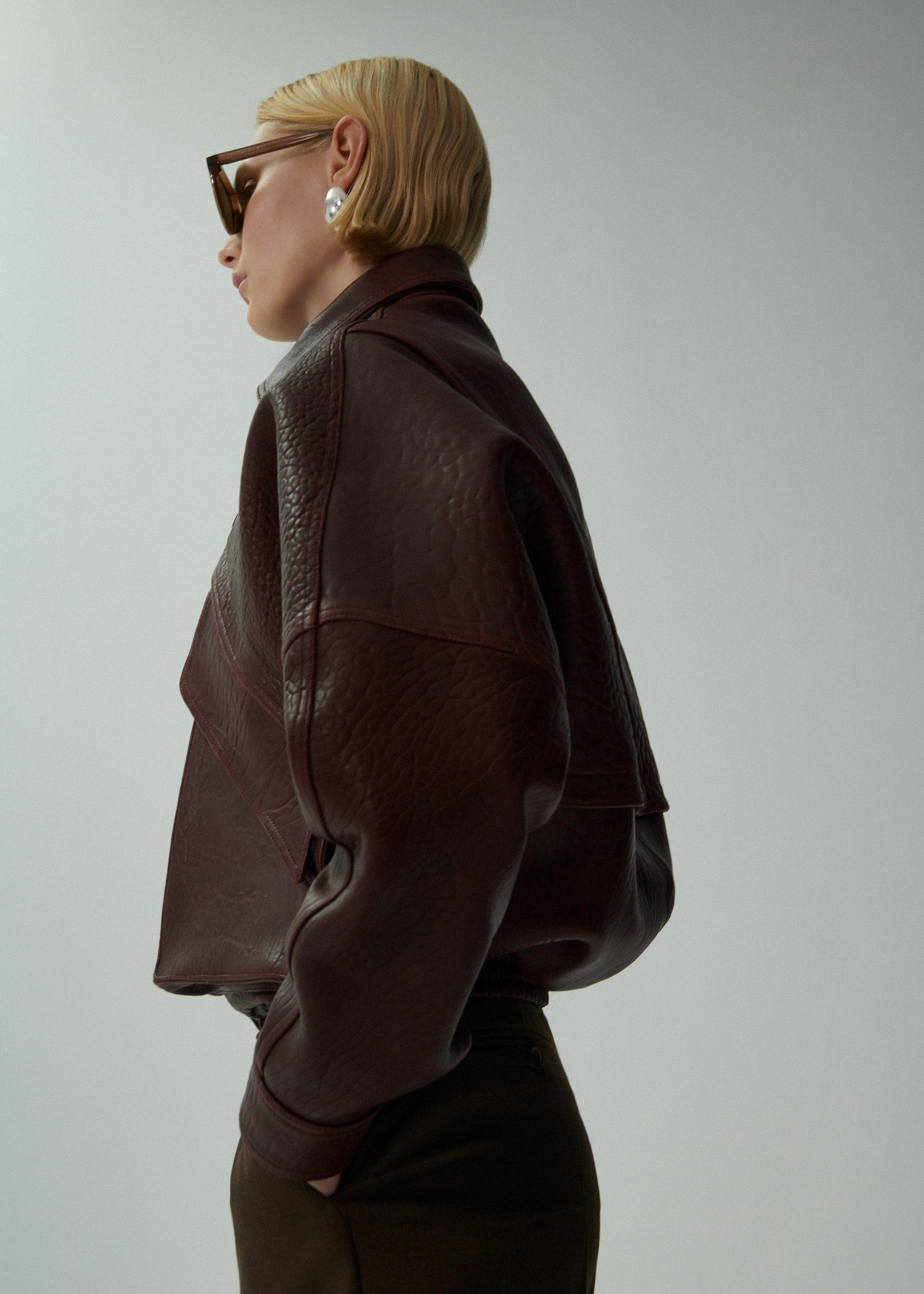 Vintage leather bomber jacket in embossed burgundy Product Image