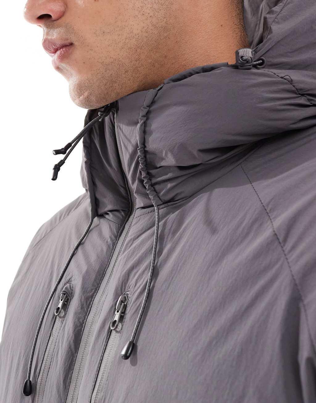 Jack & Jones hooded puffer jacket with tech details in dark gray Product Image