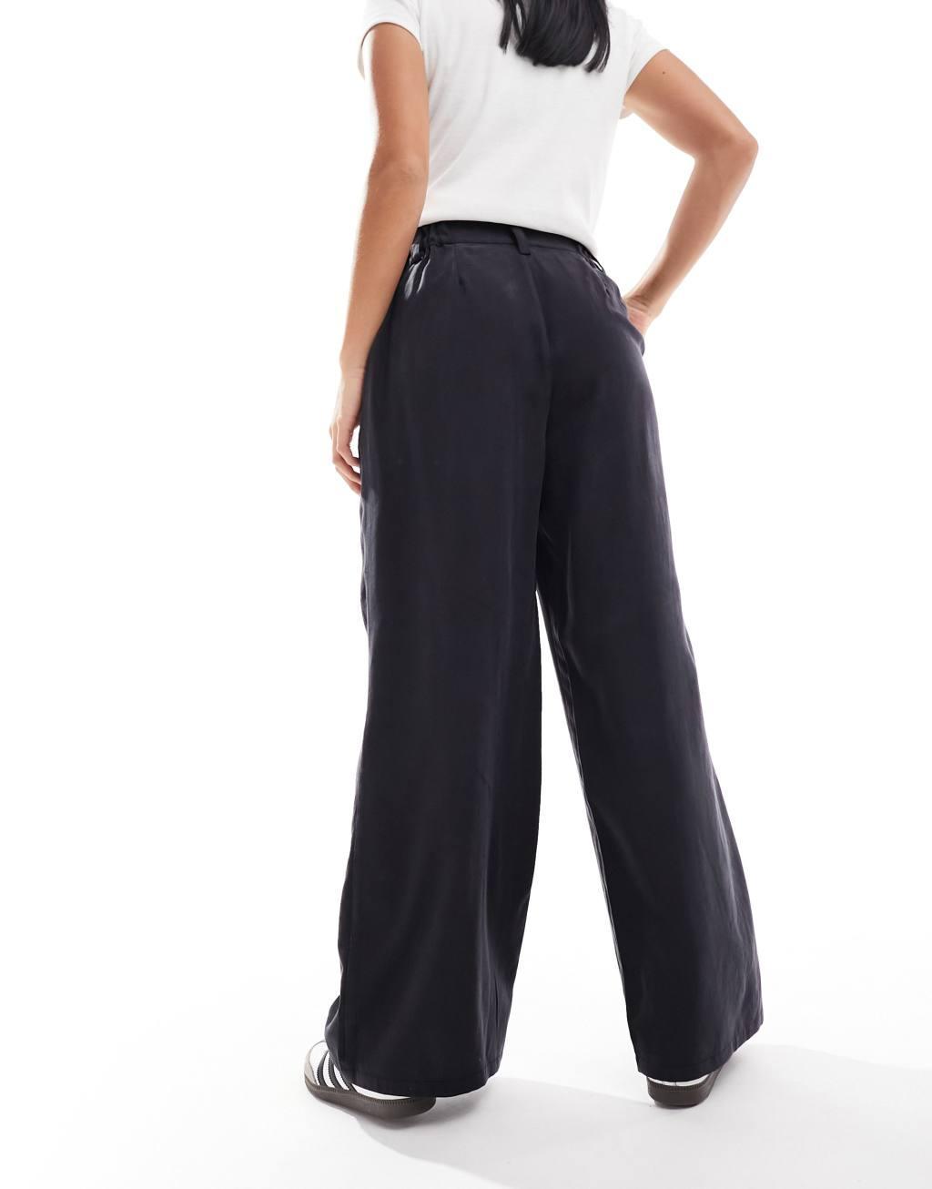 ASOS DESIGN Petite wide leg dad pants in washed black  Product Image