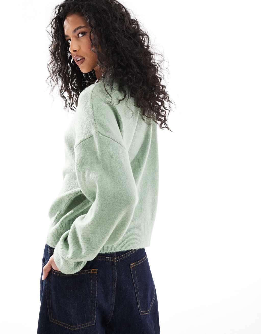 ASOS DESIGN knitted crew neck boxy sweater in green Product Image