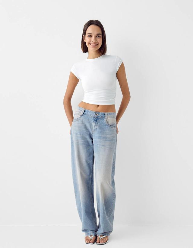 Bershka slouchy baggy jeans in light dirty wash blue Product Image