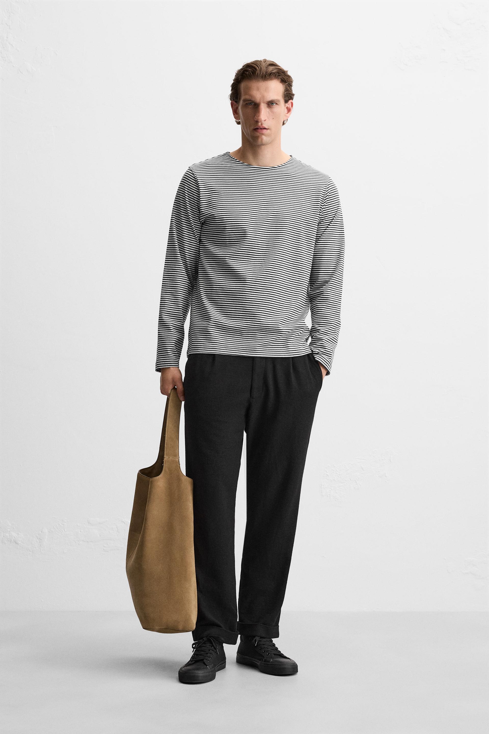 TEXTURED PLEATED PANTS Product Image