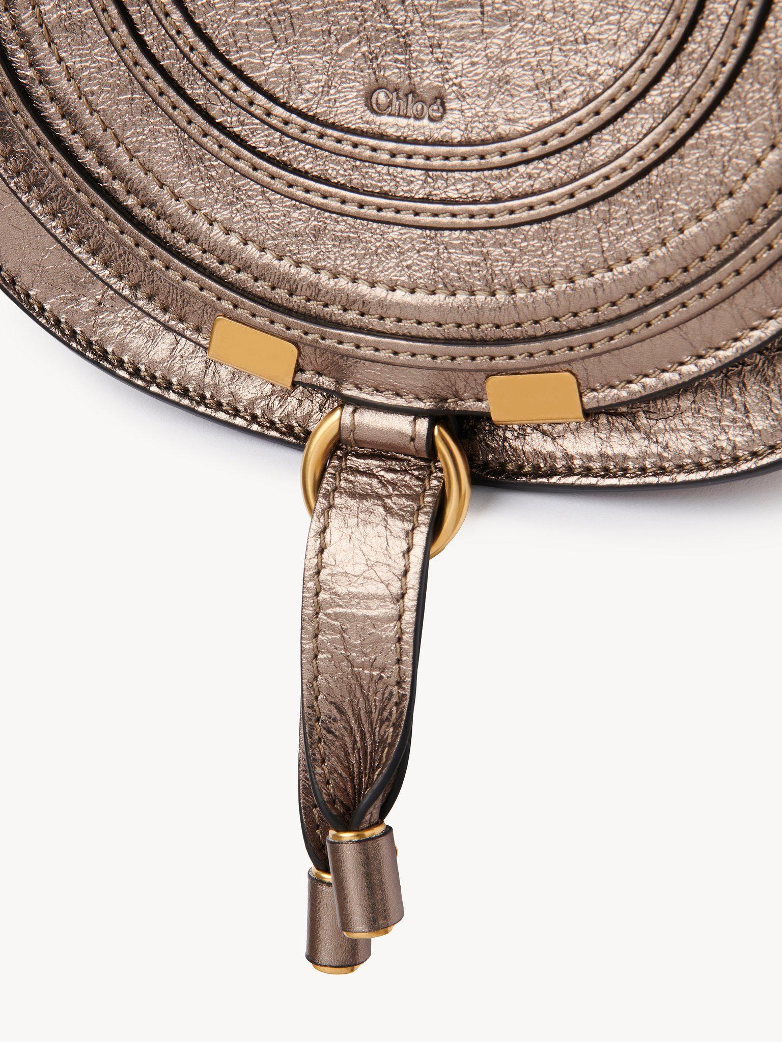 Small Marcie saddle bag in metallized leather Product Image