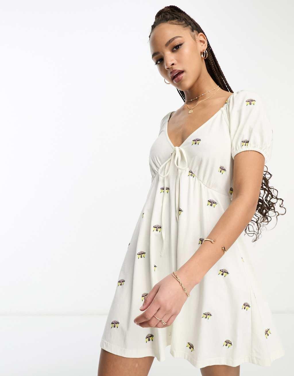 ASOS DESIGN embroidered v neck mini dress with mushroom embroidery in ecru Product Image