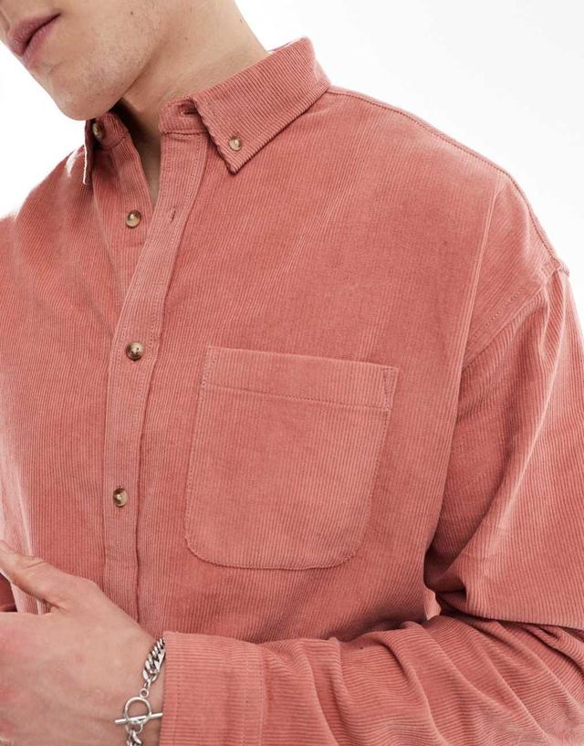 ASOS DESIGN '90s oversized cord shirt in pink Product Image