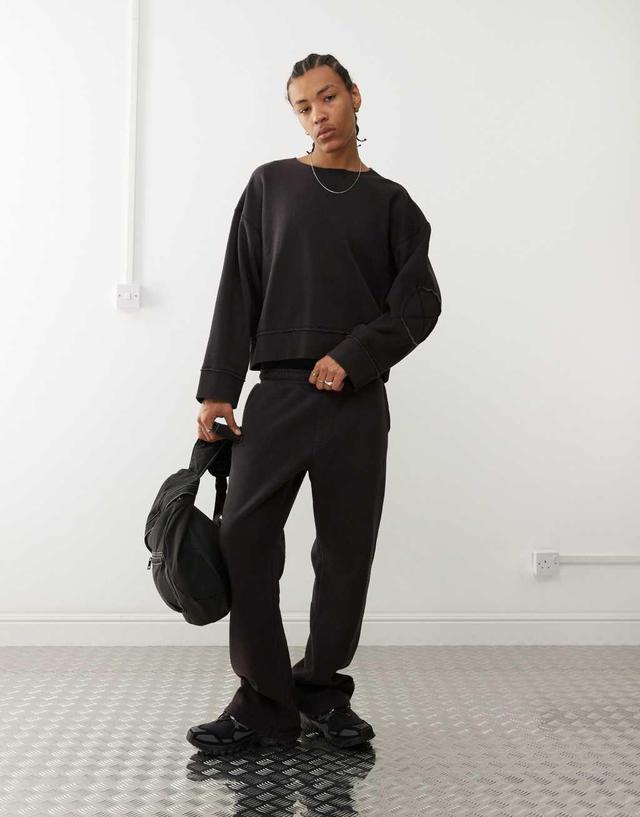 Weekday relaxed sweatpants in black acid wash - part of a set Product Image