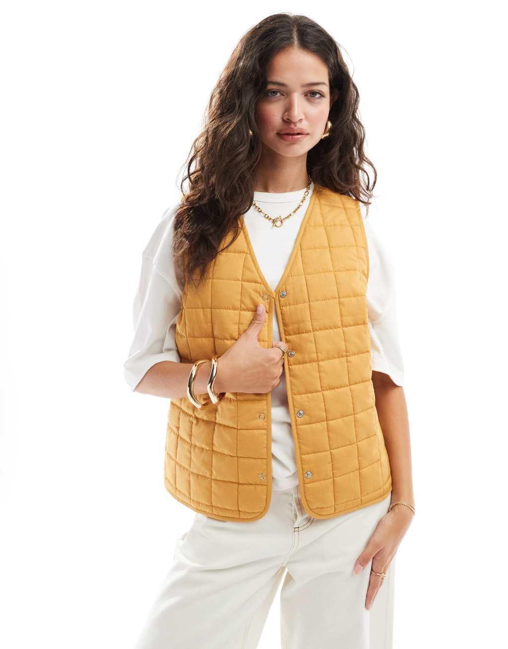 ASOS DESIGN quilted vest in mustard Product Image