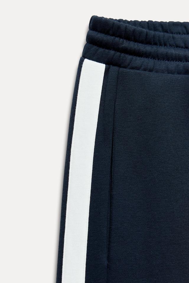 SIDE STRIPE TEXT PLUSH PANTS Product Image