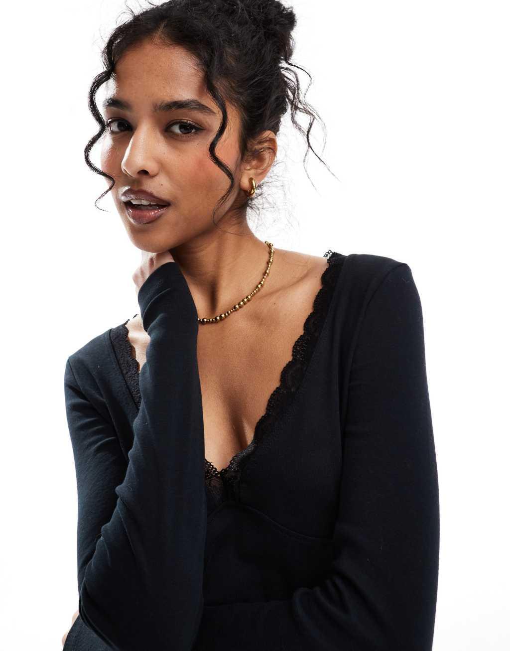 ASOS DESIGN v neck long sleeve top with lace detail in black Product Image