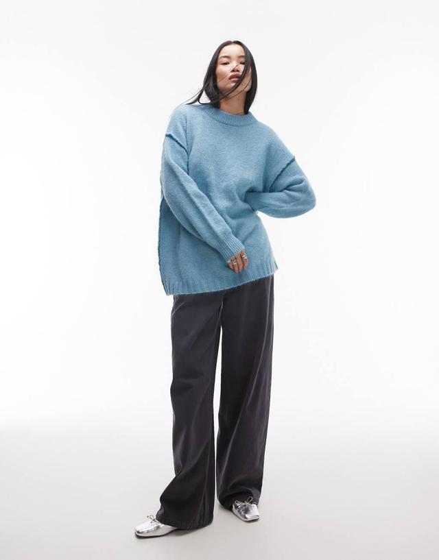 Topshop knitted exposed contrast seam oversized sweater in blue Product Image