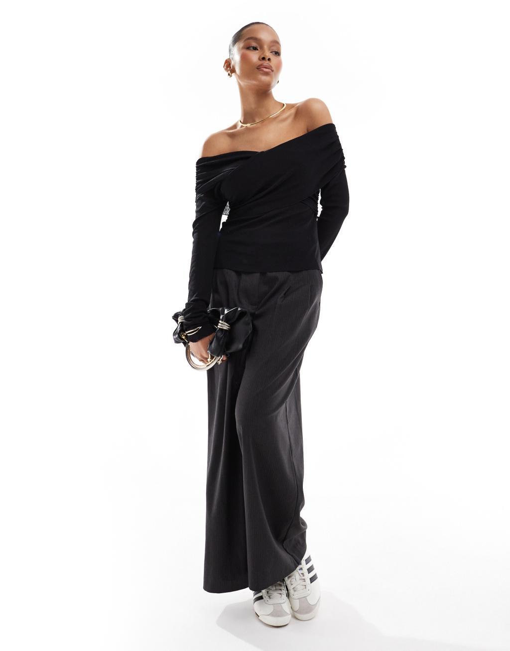 Pieces off the shoulder wrap long sleeved top in black Product Image