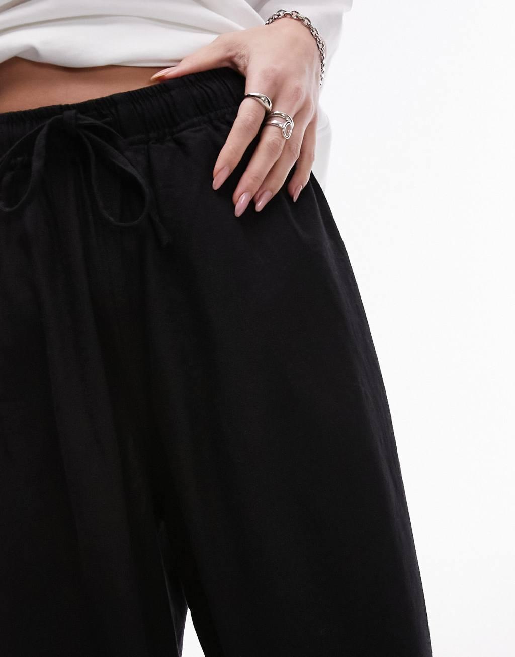 Topshop linen blend balloon pants in black Product Image