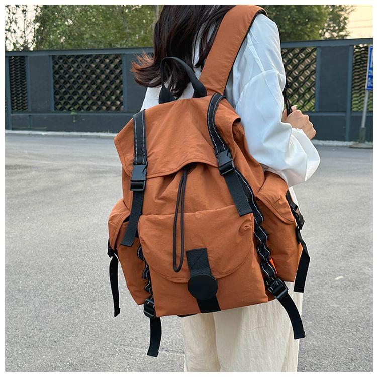 Plain Drawstring Buckled Nylon Flap Backpack Product Image