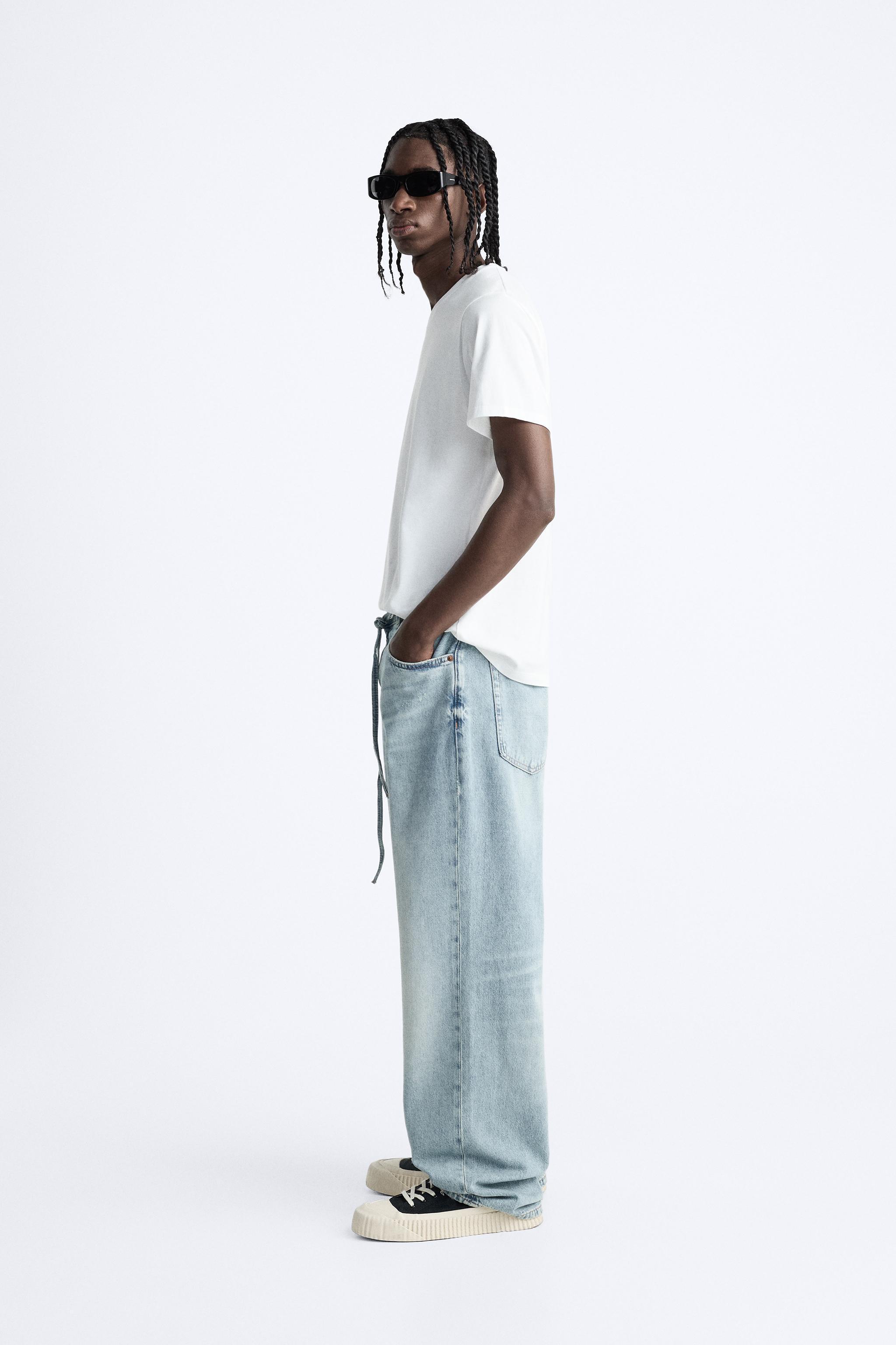 BAGGY BELTED JEANS Product Image