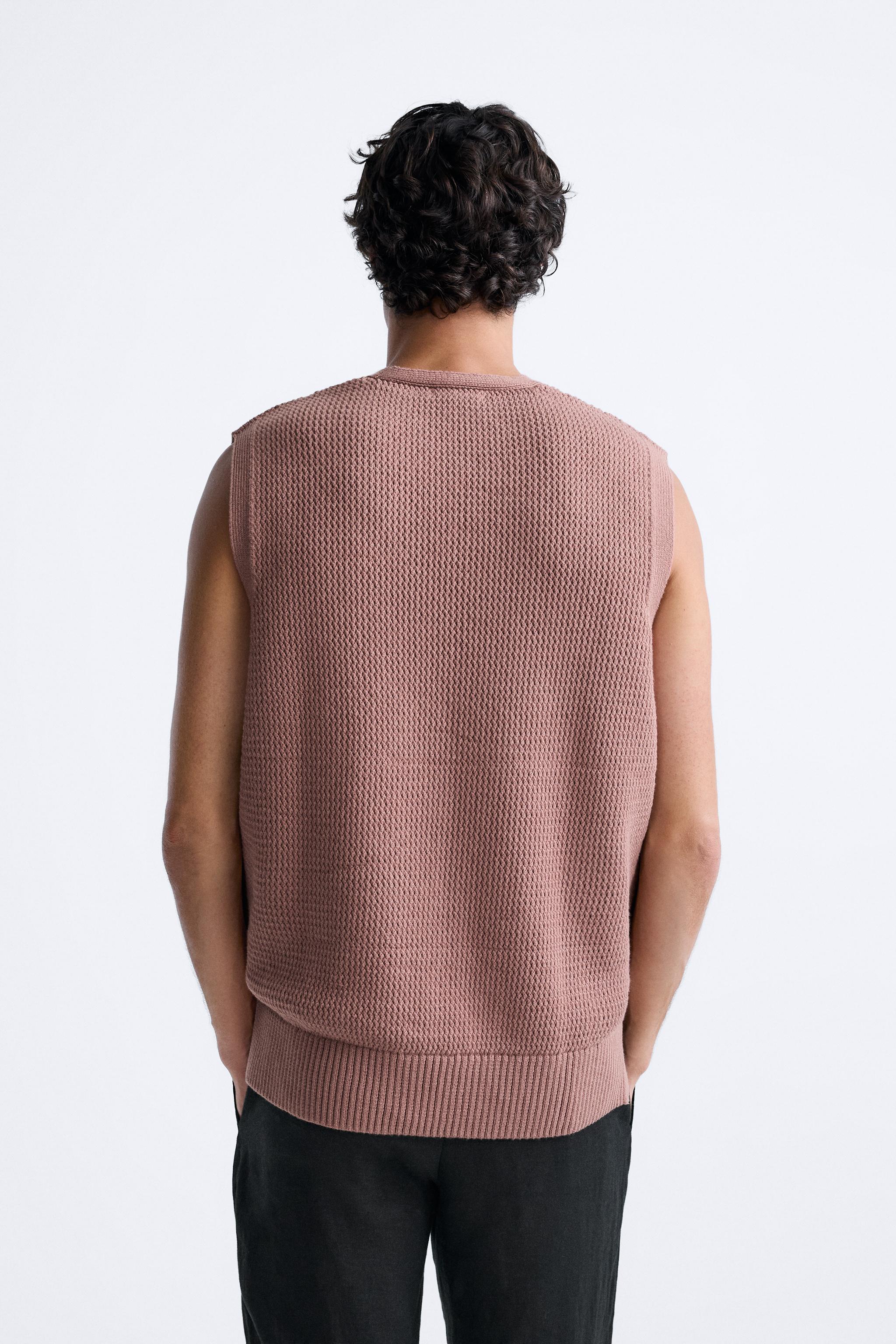 Knit vest in a cotton blend. Sleeveless with V-neckline. Rib trim. Product Image