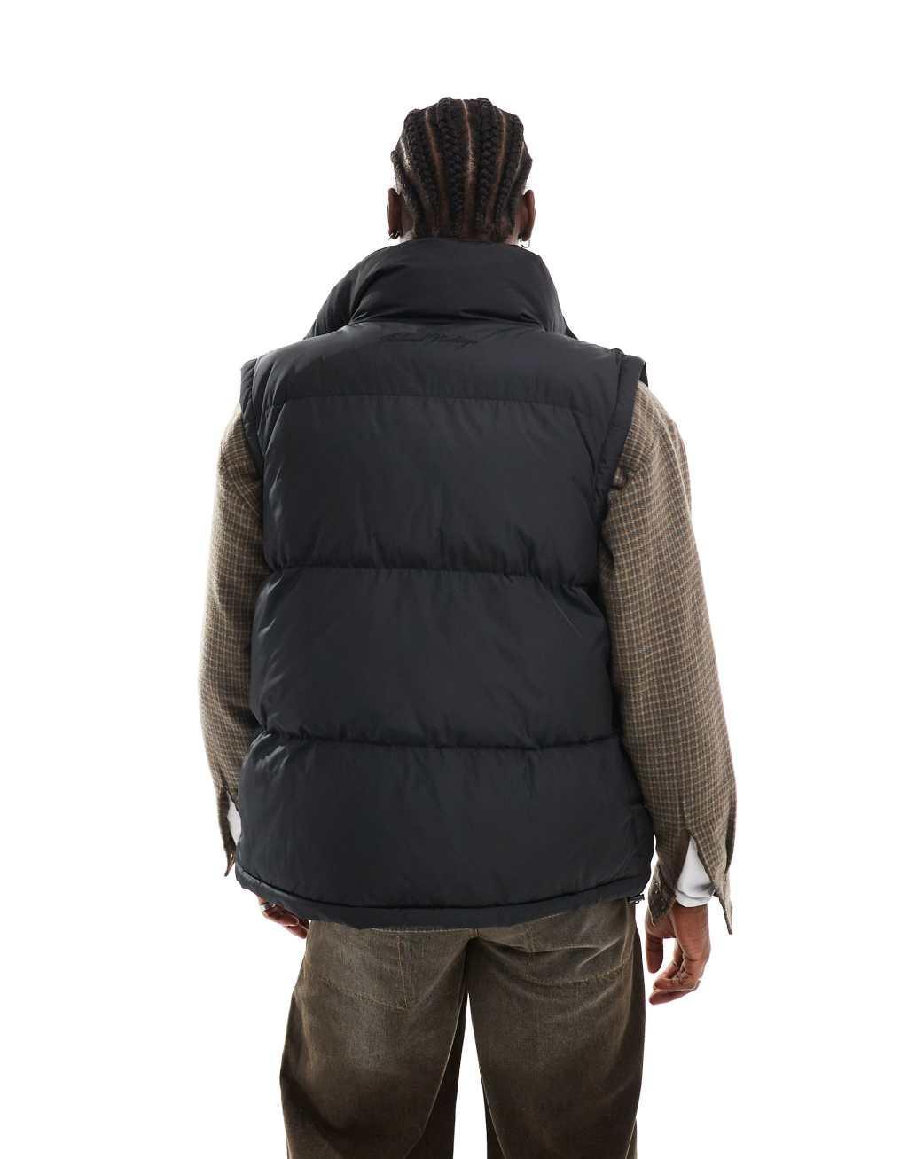 Reclaimed Vintage puffer vest in black Product Image