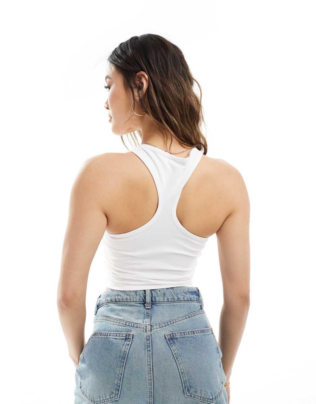 ASOS DESIGN cut out racer back tank in white Product Image