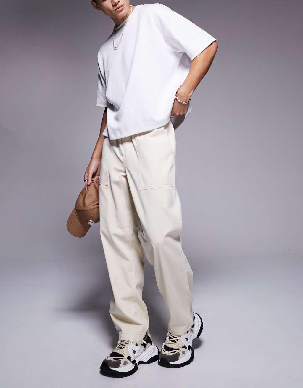 ASOS DESIGN pull on pants with carpenter detailing in beige Product Image