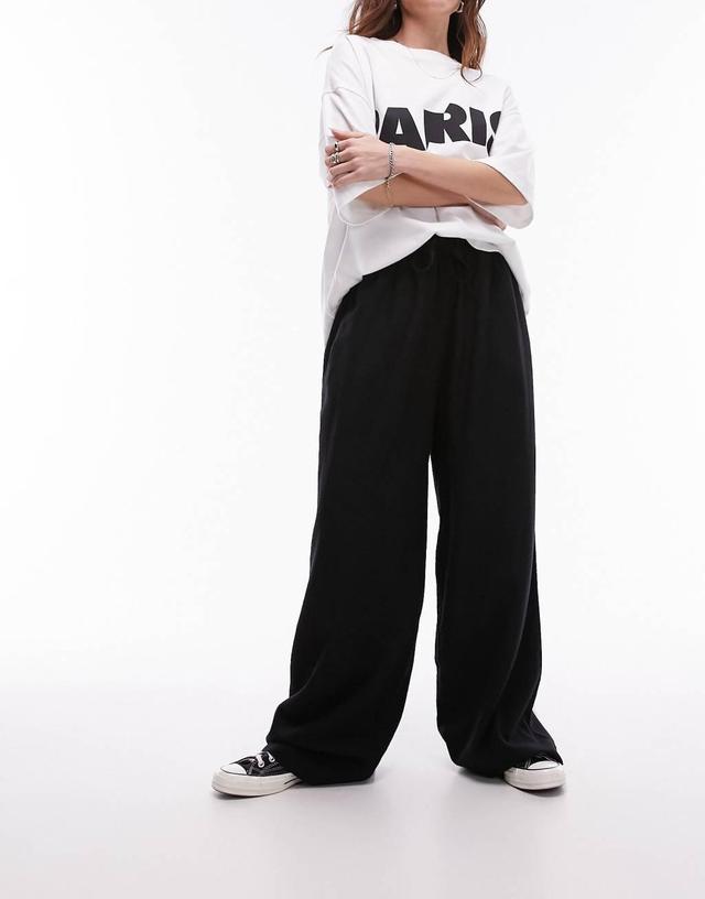 Topshop linen blend balloon pants in black Product Image