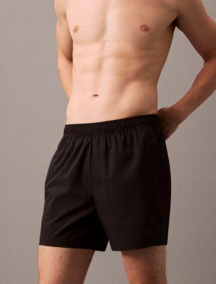 Logo Badge Solid Swim Shorts Product Image