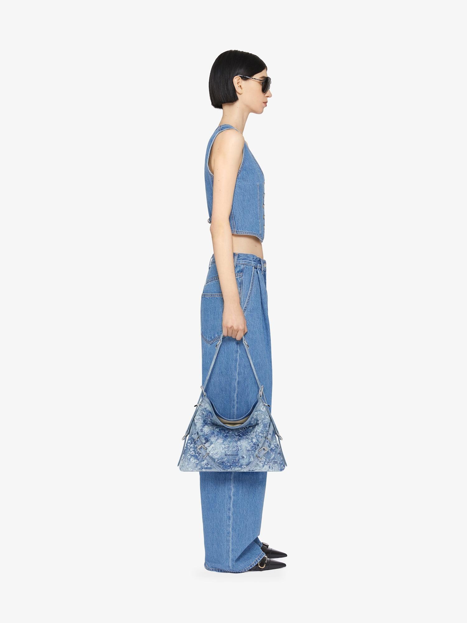 Medium Voyou bag in washed embroidered denim Product Image