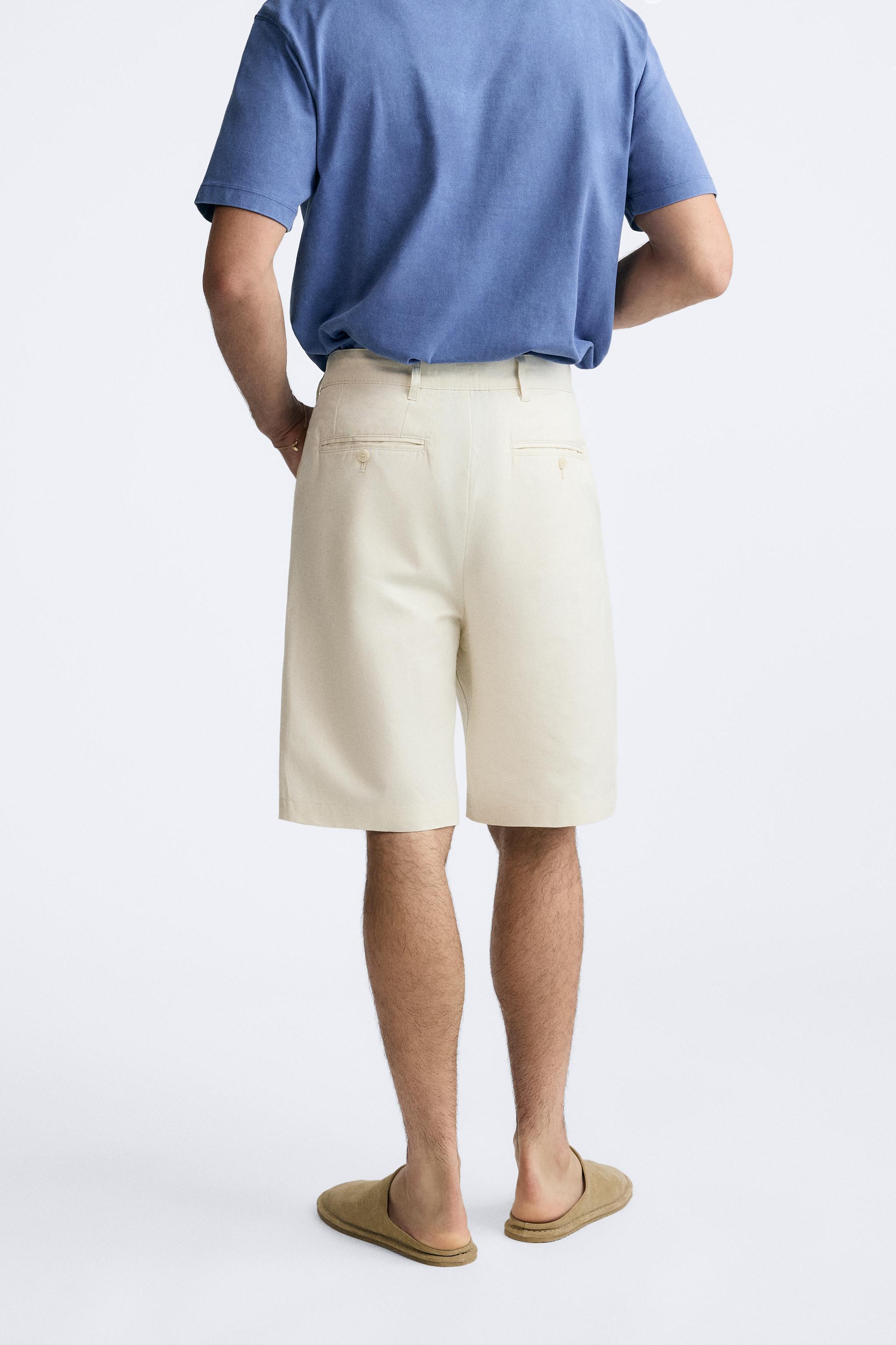 PLEATED WIDE FIT SHORTS Product Image