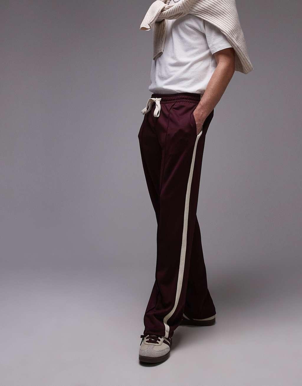 Topman straight leg sweatpants with side stripe in burgundy Product Image