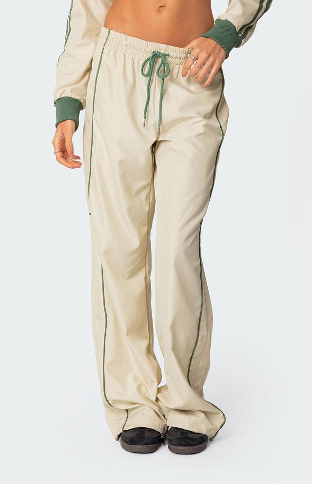 Edikted Women's Superstar Nylon Track Pants in White/Olive - Product Image