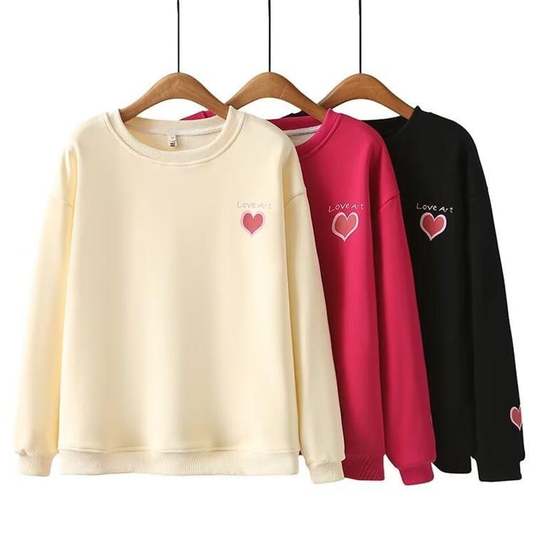 Plus Size Round Neck Heart Print Fleece-Lined Pullover Product Image