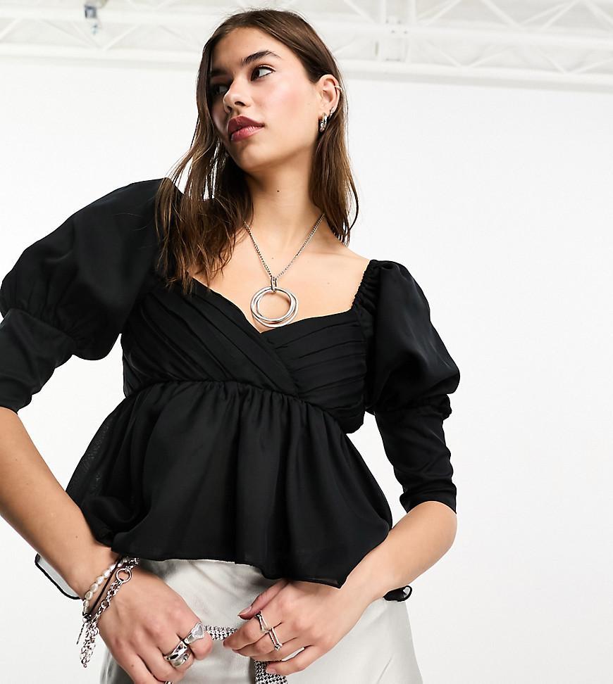 Reclaimed Vintage blouse with puff sleeve and asymmetric hem-Black Product Image