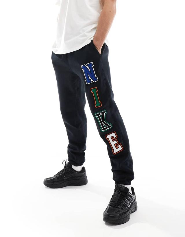 Nike Club chenille logo sweatpants in black Product Image