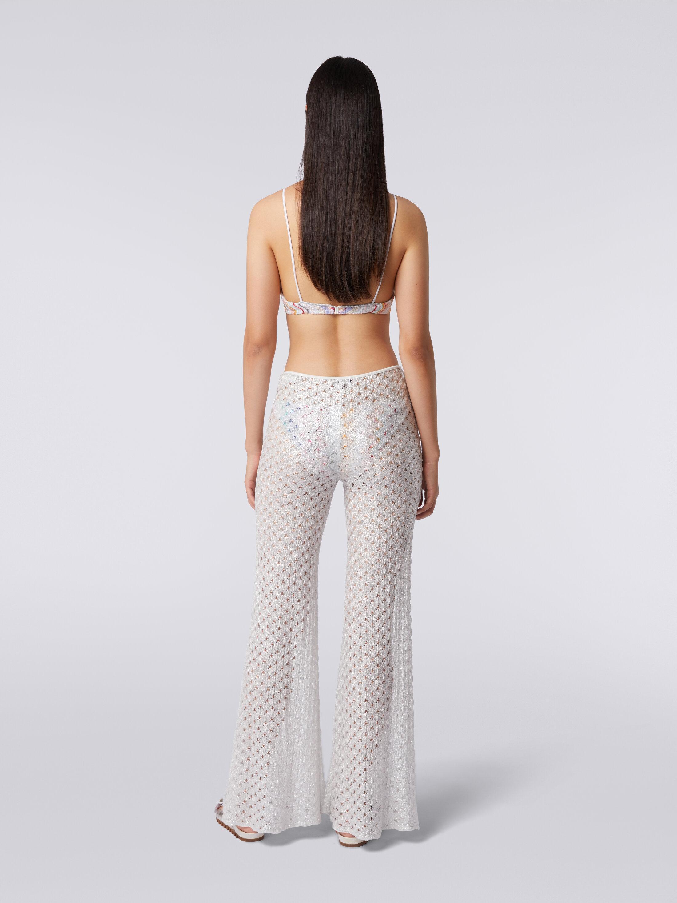 Lace-effect cover up trousers with flared hem Product Image