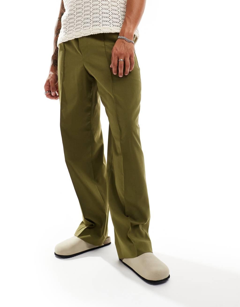 ASOS DESIGN pull on smart wide leg elasticated waistband pants in green Product Image