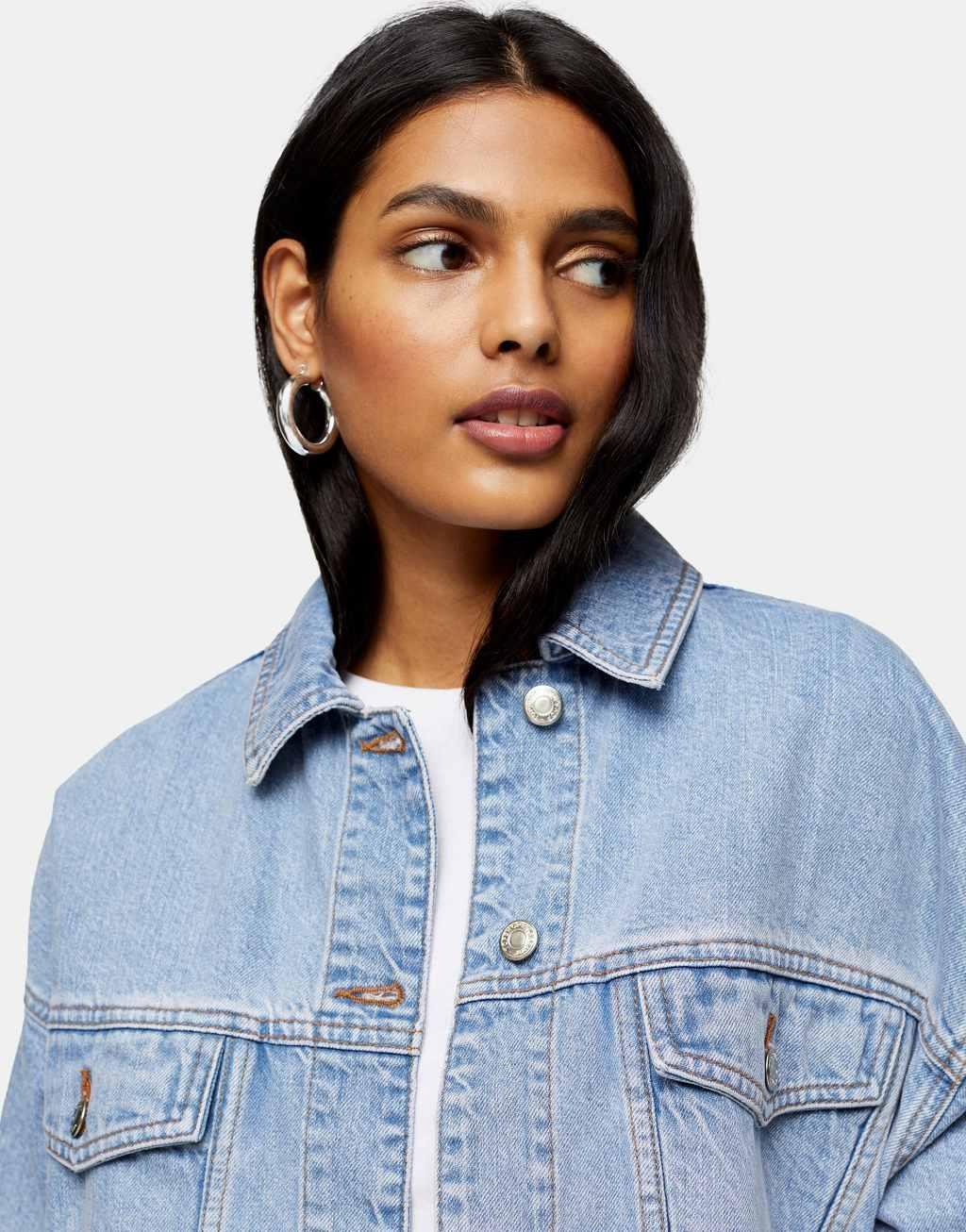 Topshop oversized denim jacket in mid blue wash Product Image