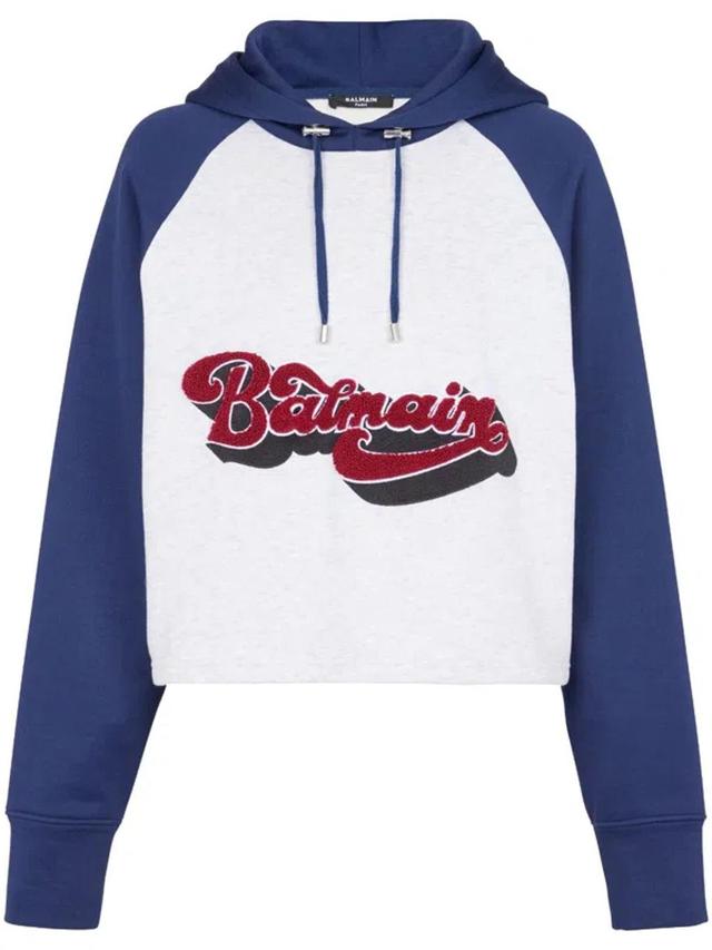 BALMAIN Logo-print Raglan-sleeve Hoddie In White Product Image