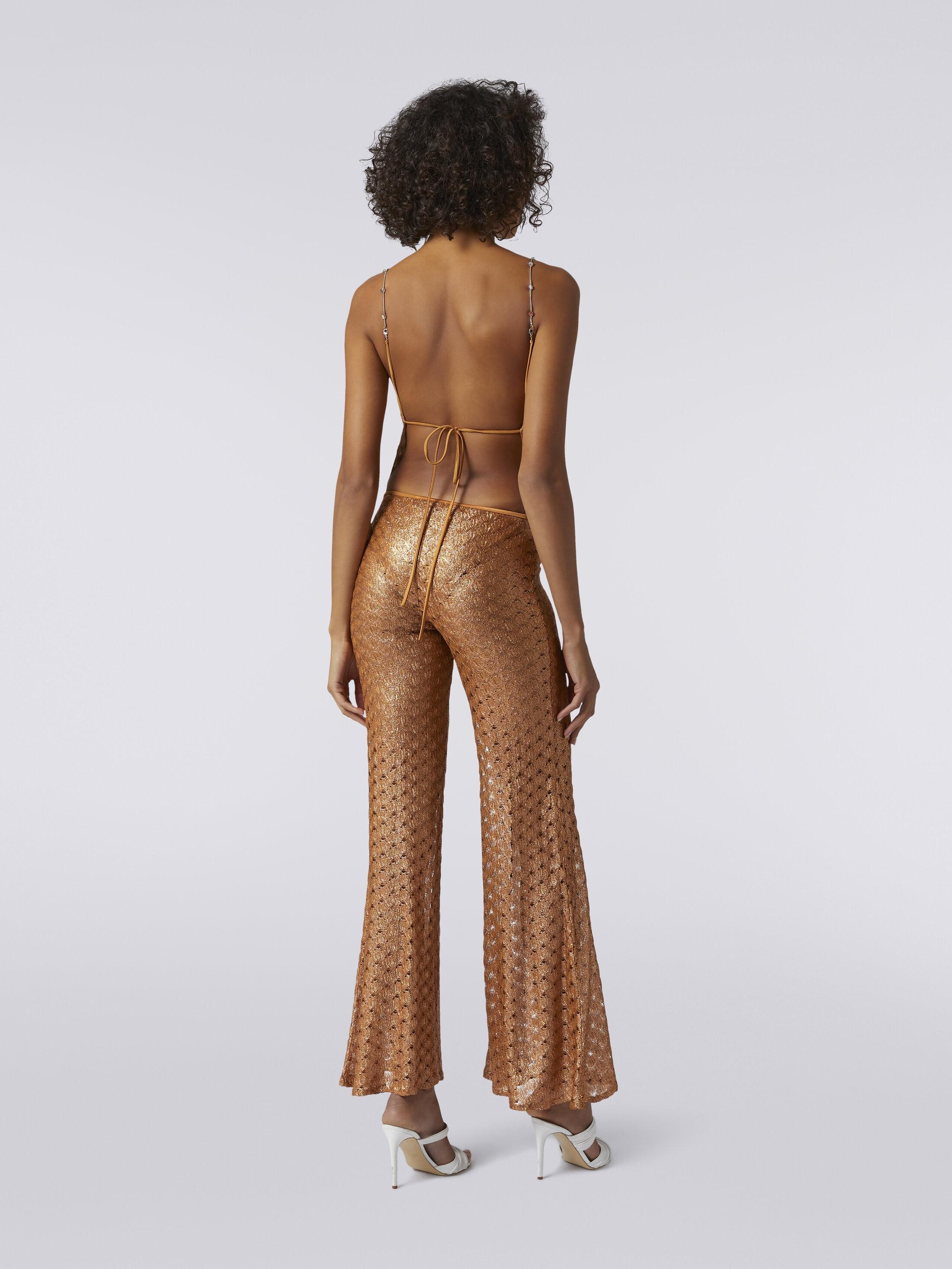 Lace-effect cover up trousers with flared hem Product Image