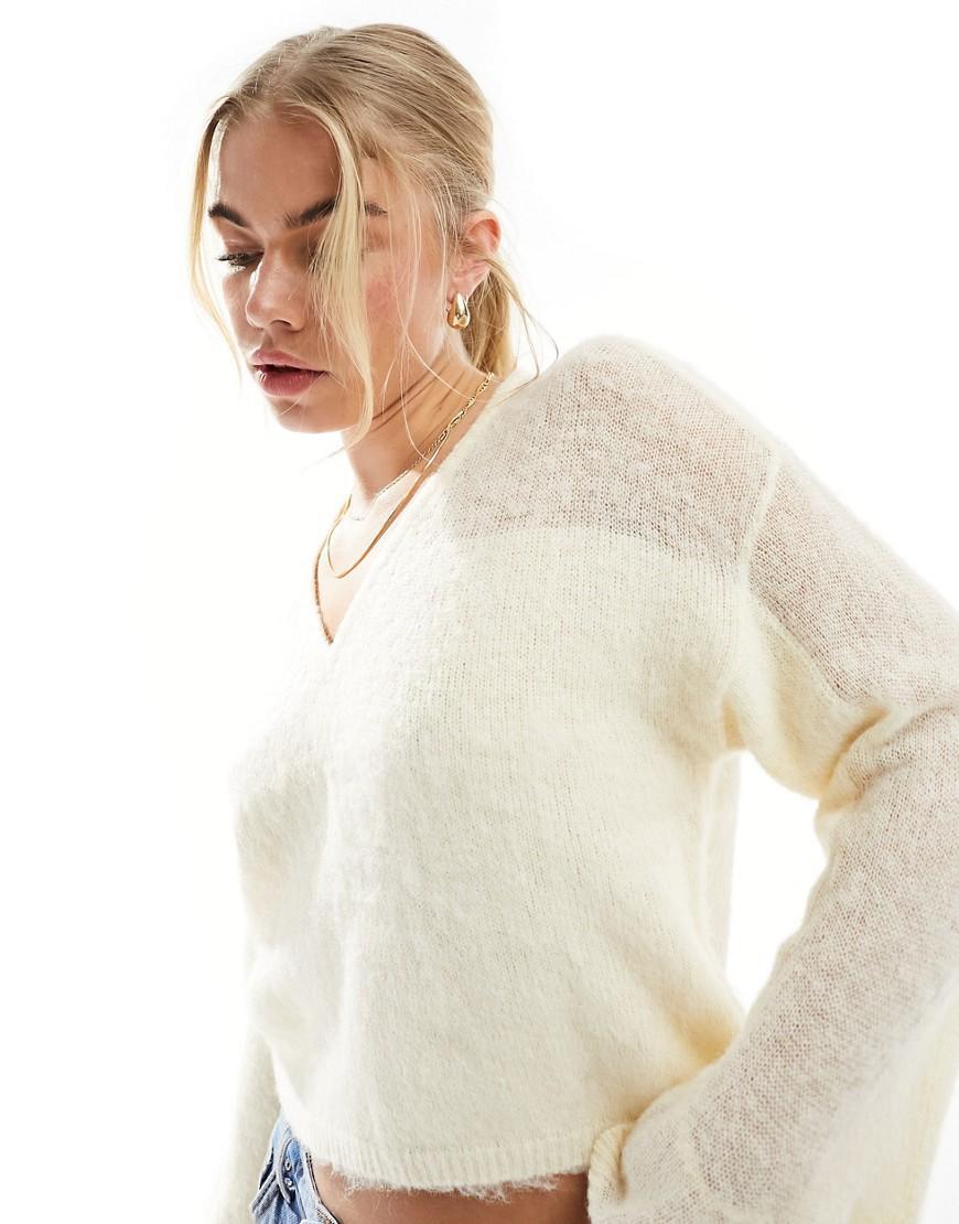 ASOS DESIGN V-neck sweater with sheer panel in cream Product Image