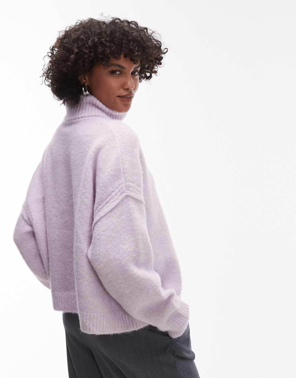 Topshop knitted exposed seam roll neck relaxed sweater in lilac Product Image