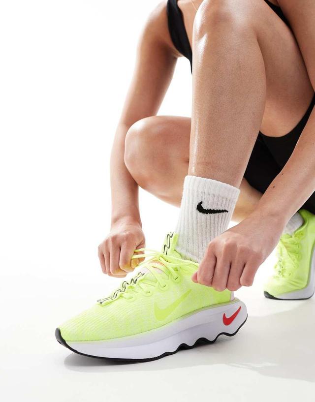 Nike Training Motiva sneakers in neon green Product Image